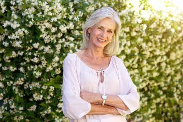 Older woman happy with urinary incontinence treatment Reigate